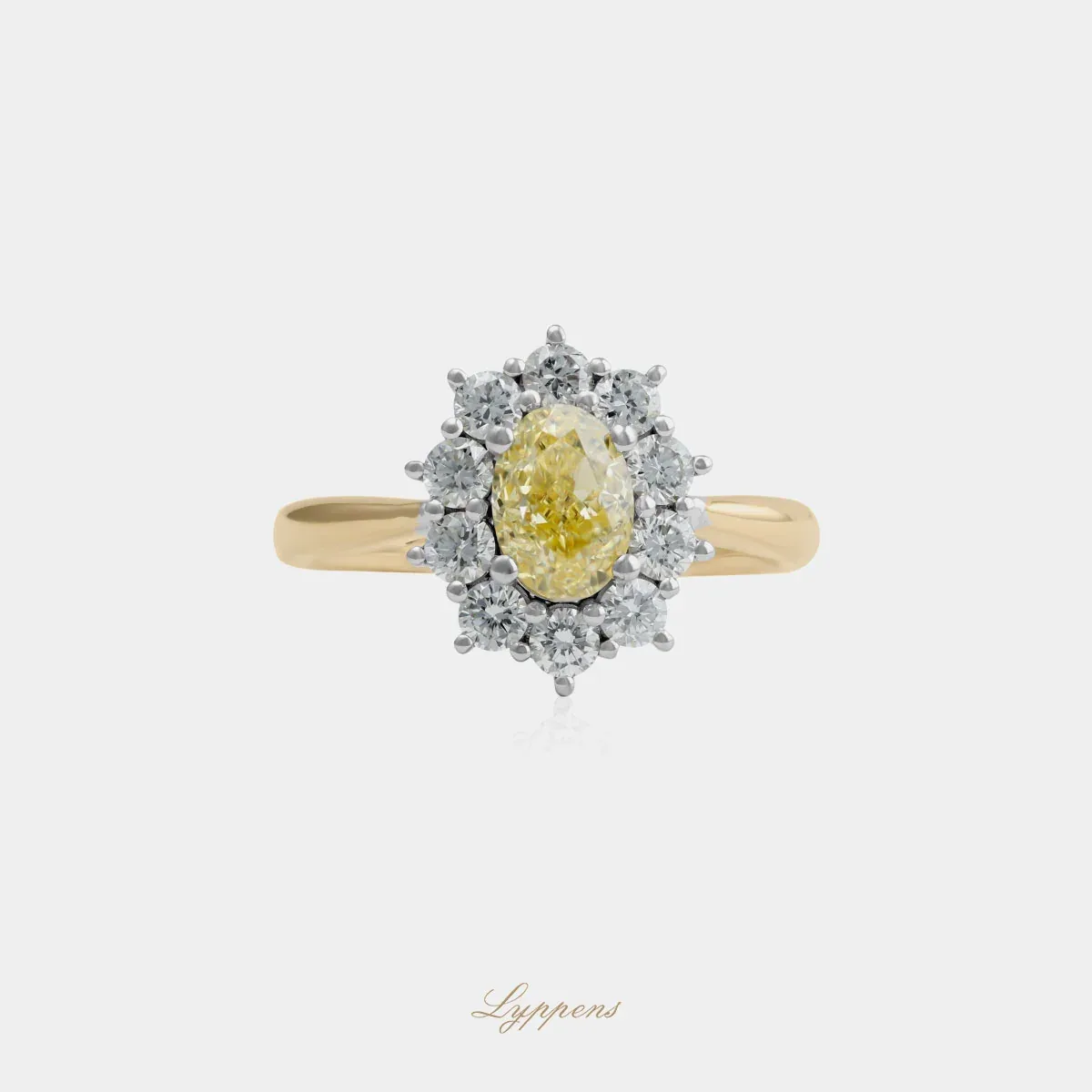 Geelgouden entourage ring met fancy yellow en witte diamant