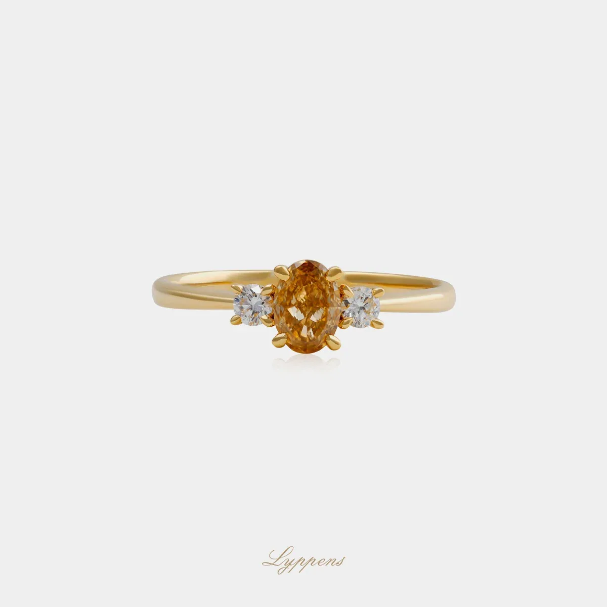 Geelgouden ring met bruine en witte diamant