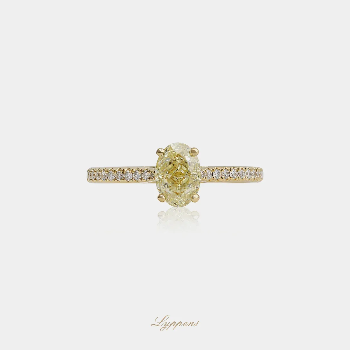 Geelgouden solitaire ring met fancy yellow en witte diamant